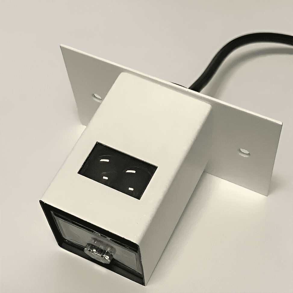 A white box with a black power outlet on it.